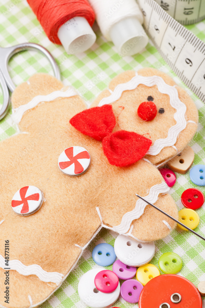 Sewing set and handmade gingerbread man from textile