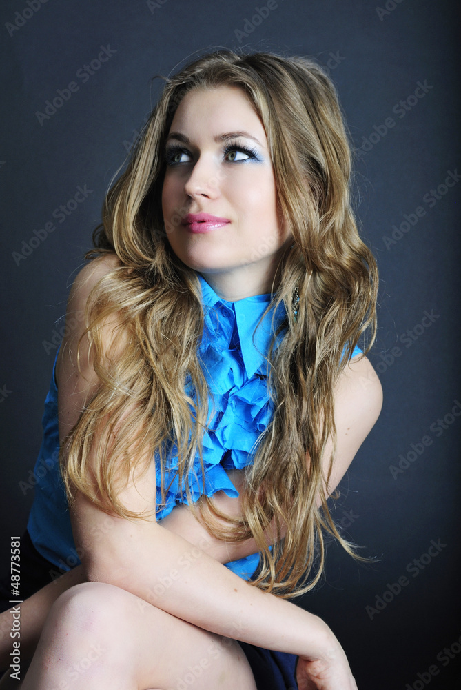 Naklejka premium bright portrait of the beautiful girl with long hair