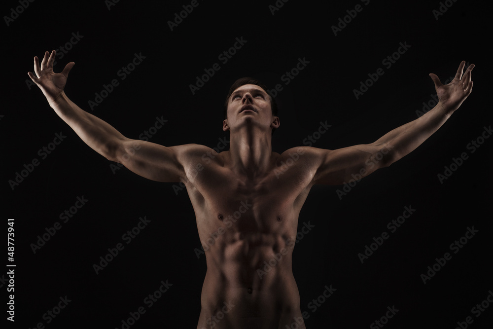 Muscular naked man from back Muscular naked man from back