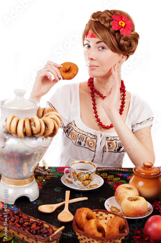 Russian woman eating traditional food