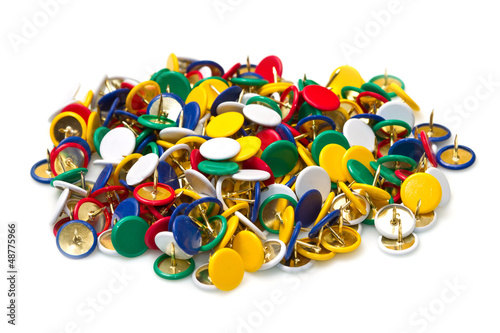 a group of colored pushpins