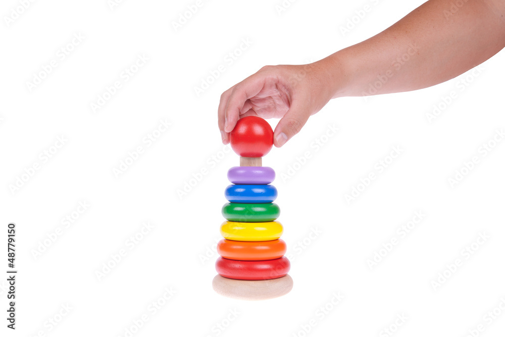 Colorful wooden toy isolated on white background
