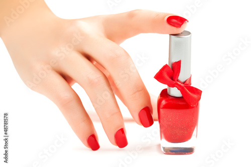 Hands with red manicure isolated