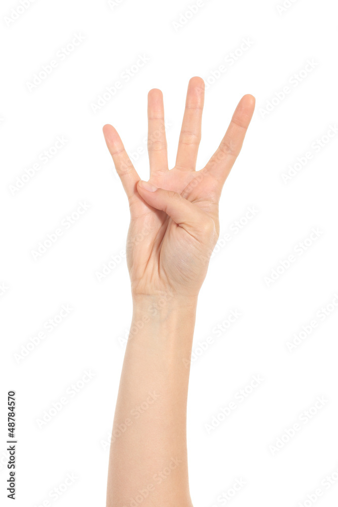 Woman hand showing four fingers Woman hand showing four fingers