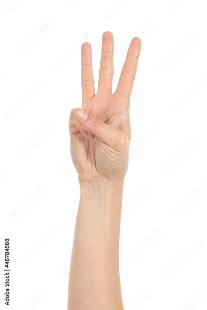 Woman hand showing three fingers Woman hand showing three fingers