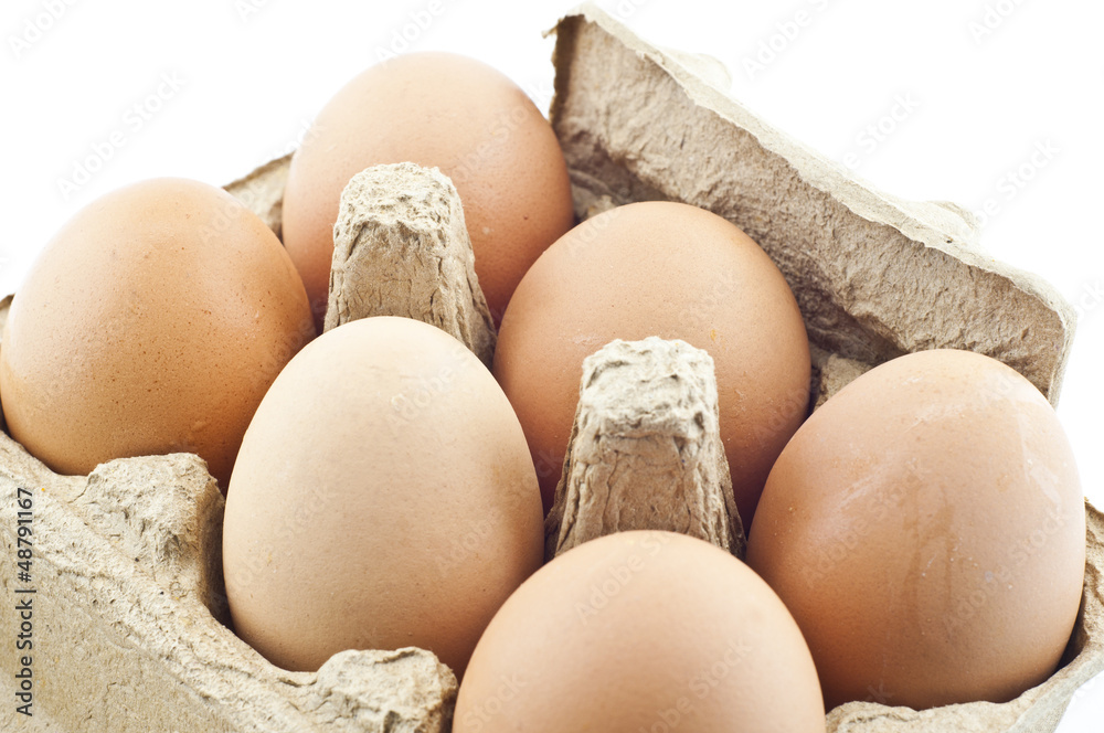 Eggs in paper tray. Eggs in paper tray.
