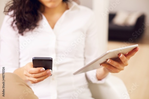 Canvas Print Modern Woman with a Smartphone and Tablet