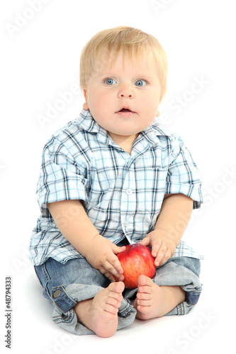 Little boy with red apple, ...