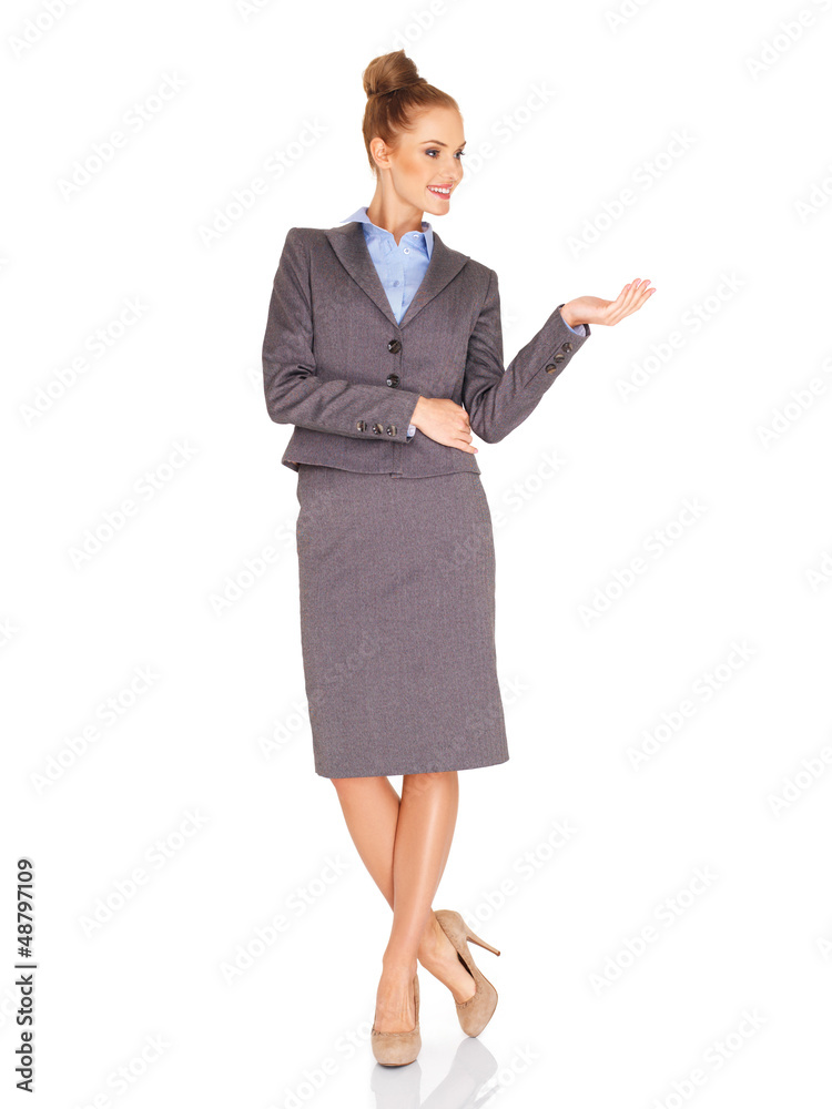 Stylish businesswoman holding out her palm Stylish businesswoman holding out her palm