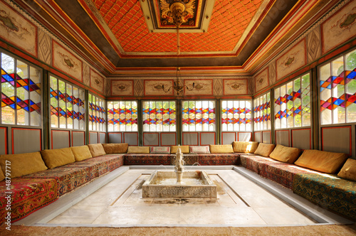 Crimea khan palace interior room with sofa and fountain photo