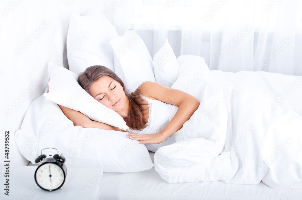 Woman resting in bed Woman resting in bed