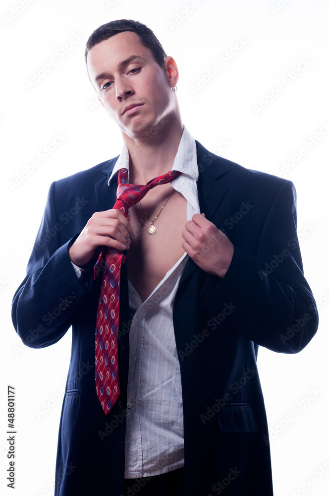 Young handsome businessman taking off his clothes Stock Photo Adobe Stock