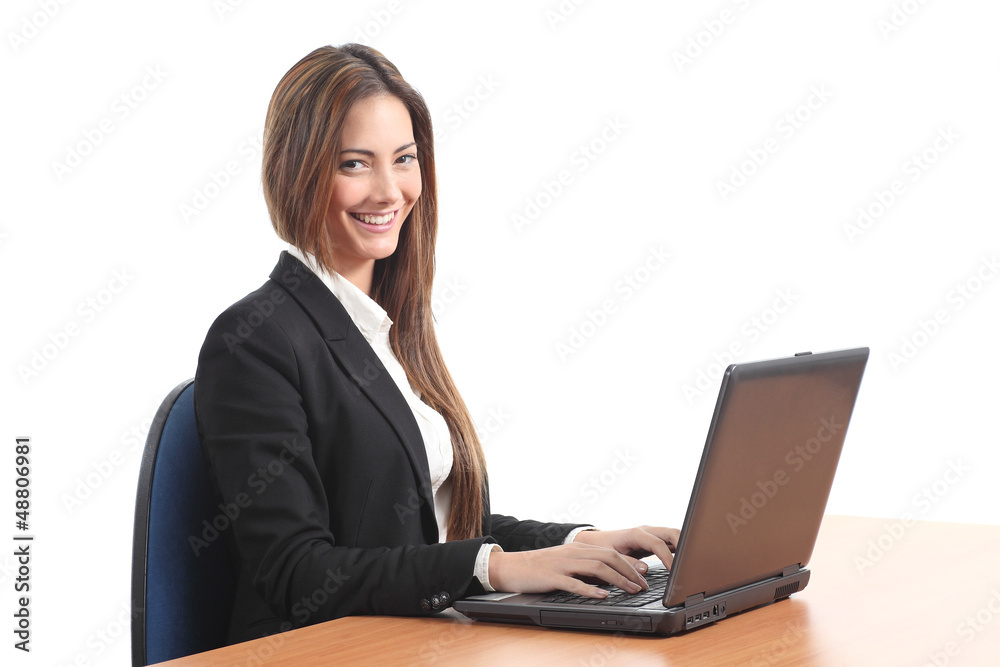 Beautiful business woman smiling and looking at the camera Beautiful business woman smiling and looking at the camera