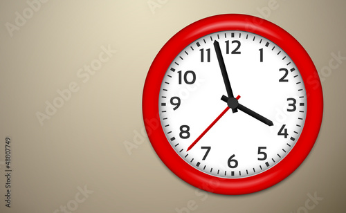 Red Clocks on brown wall