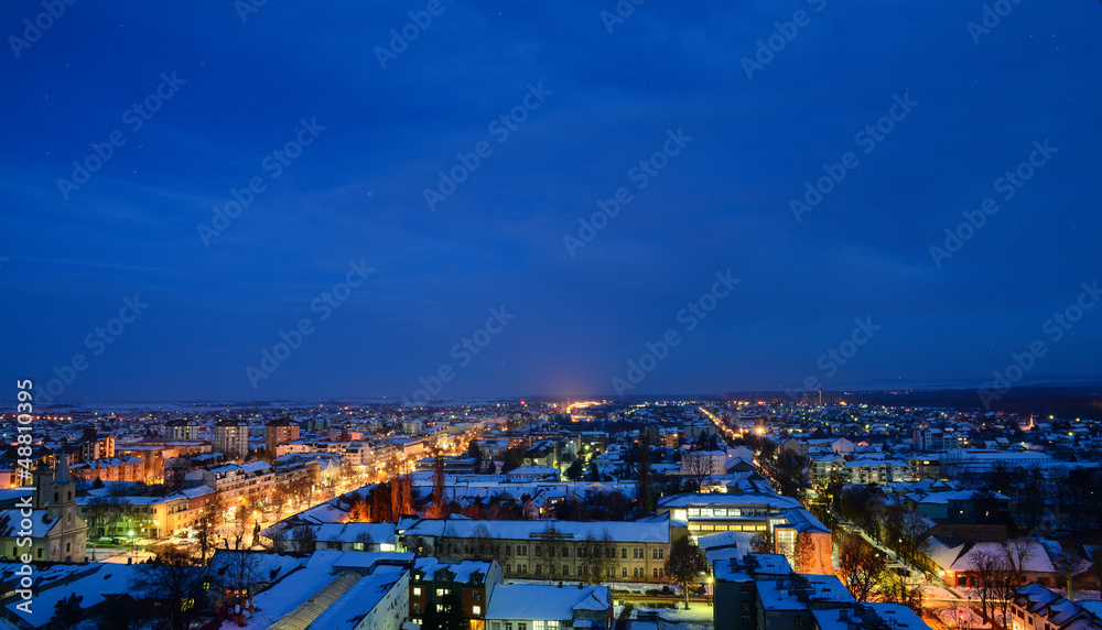 City ​​In Night In The Snow