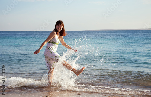 Happy  woman at sea  coast