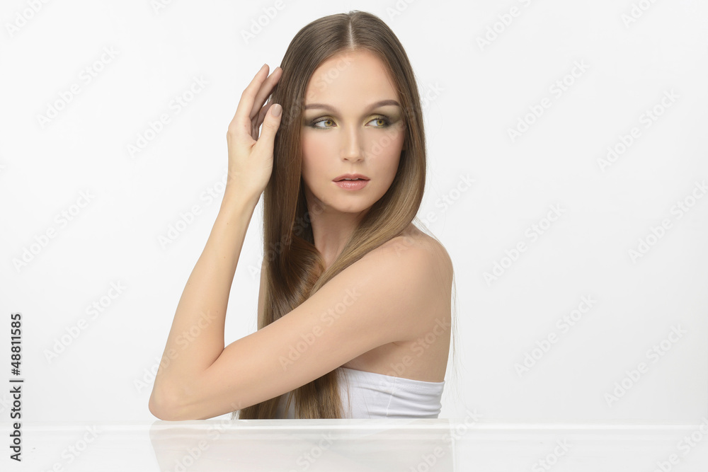 Portrait of young beautiful woman with long glossy hair Portrait of young beautiful woman with long glossy hair