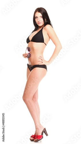 Portrait of sexy brunette in brown bikini isolated