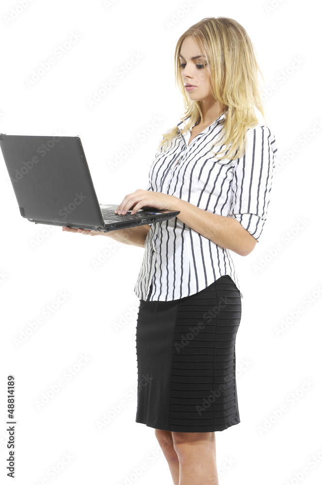 Fototapeta premium young blonde business woman standing using laptop