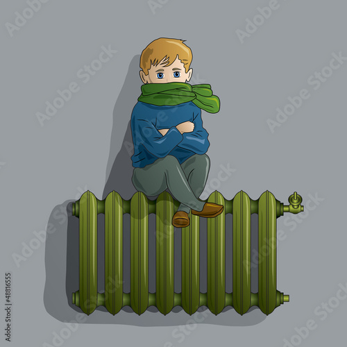 Frozen boy on an old radiator