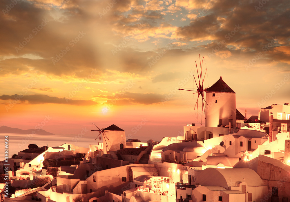 Windmills in Santorini against sunset, Greece