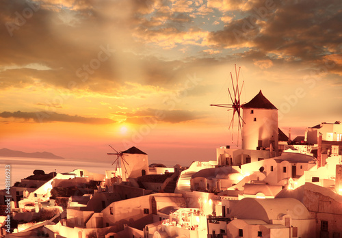 Windmills in Santorini against sunset  Greece