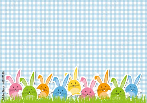 Fröhliche Osterhasen auf Karo-Hintergrund