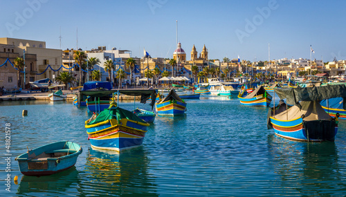 Colourful fishing boats in Marsaxlokk photo
