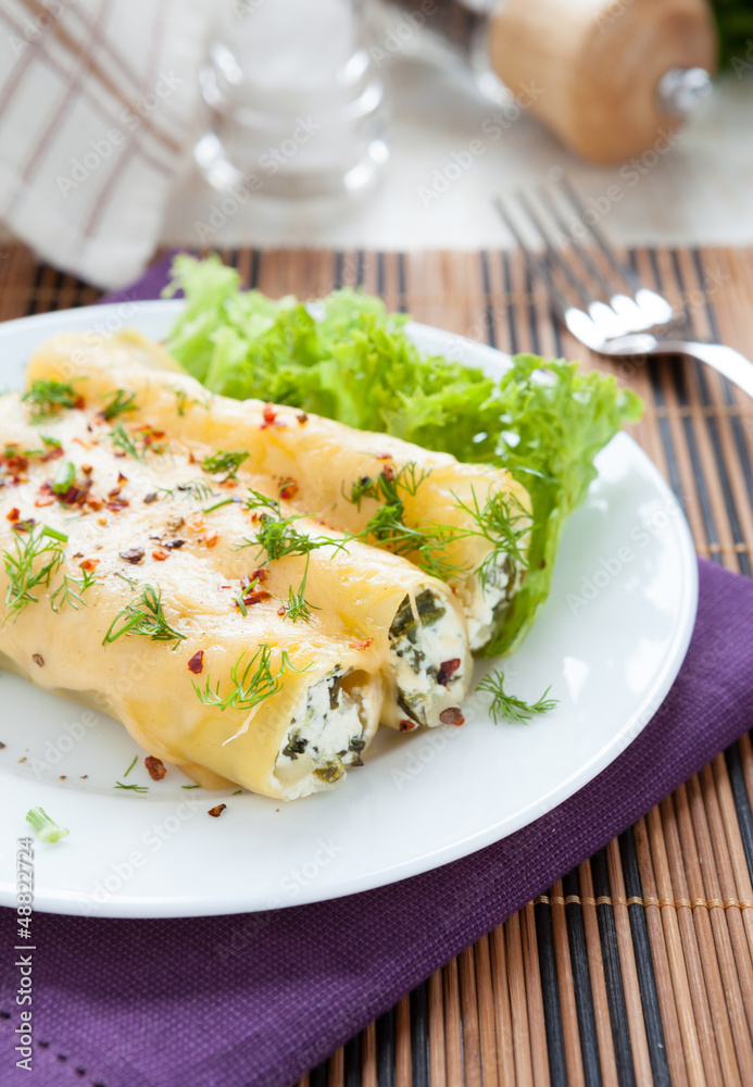 cannelloni stuffed with spinach and soft cheese cannelloni stuffed with spinach and soft cheese