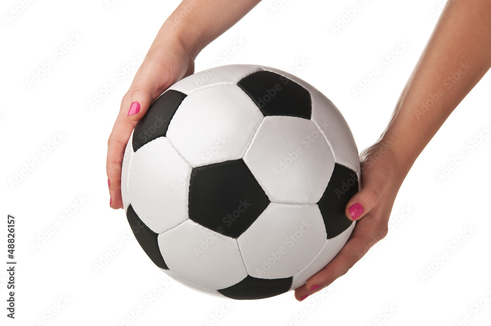 woman holding a soccer ball