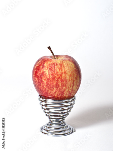 Apple in an egg cup