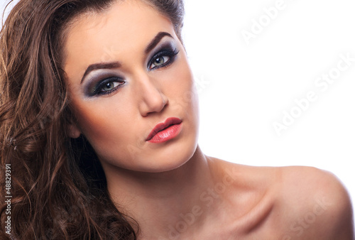 Portrait of a beautiful woman model on white background
