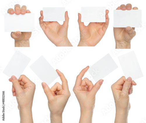 Hands hold business cards collage on white background .