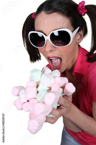 Girl going crazy for marshmallows