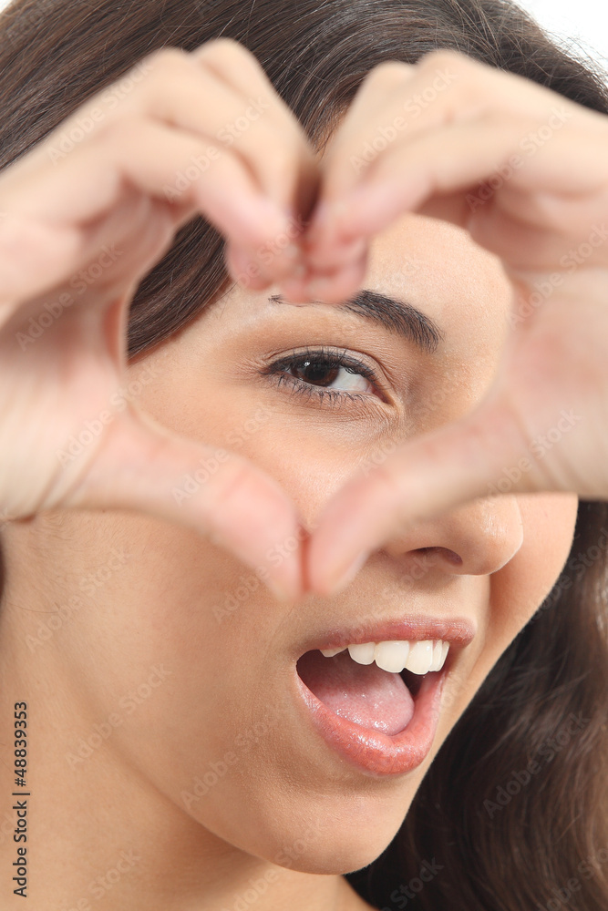 Beautiful woman making a heart shape Beautiful woman making a heart shape