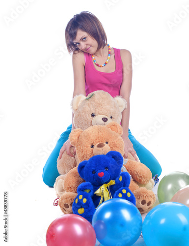 teenager girl holding toy bear. photo