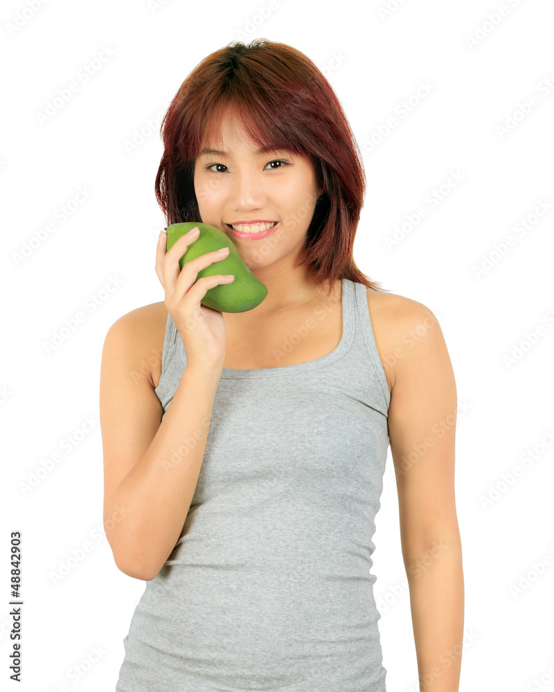 Isolated young asian woman with a mango over white. Isolated young asian woman with a mango over white.