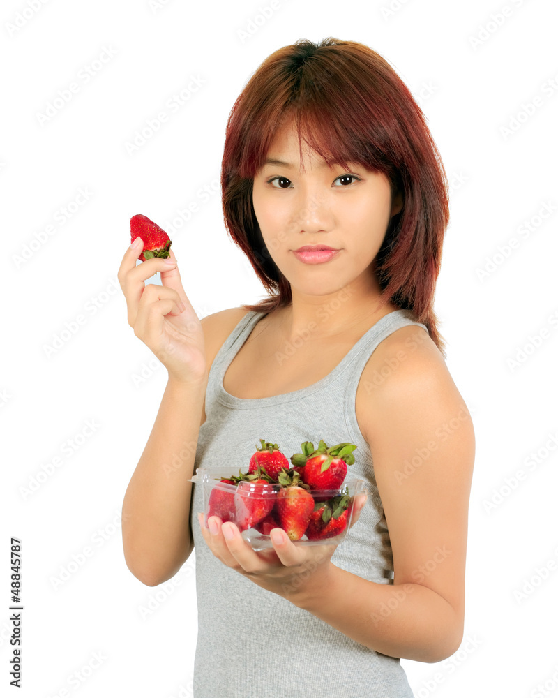 Isolated young asian woman with strawberry Isolated young asian woman with strawberry