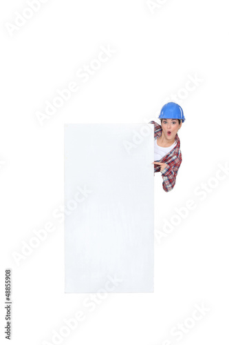 Construction worker with a blank board © auremar