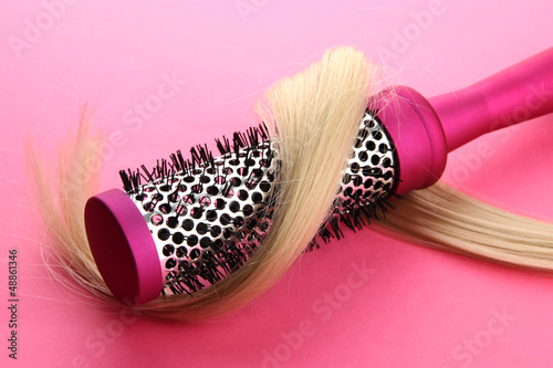 Comb brush with hair,  on p...