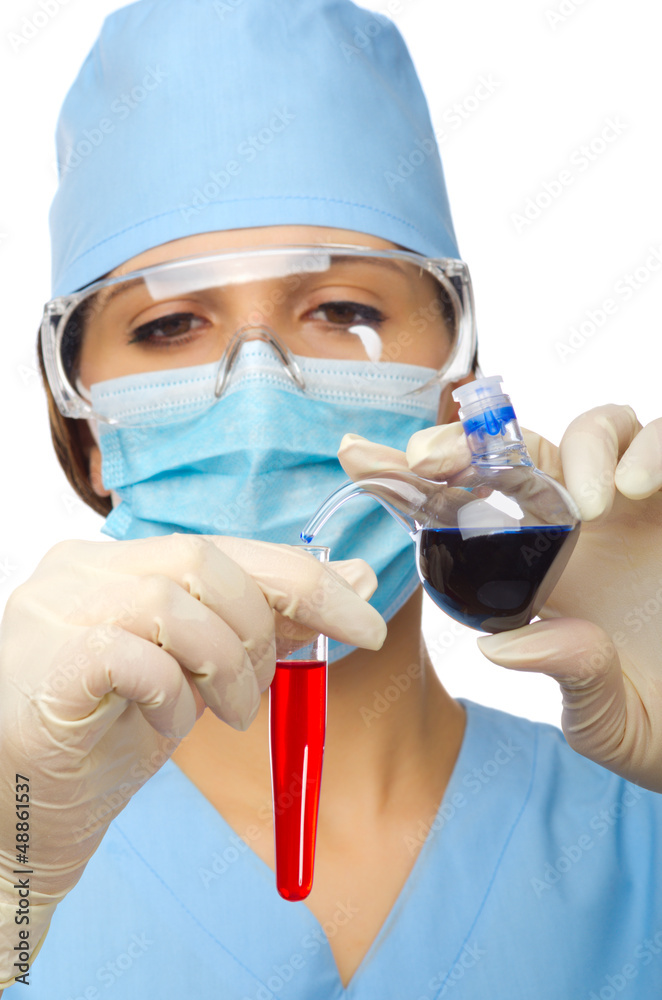 Young chemist with vials Young chemist with vials