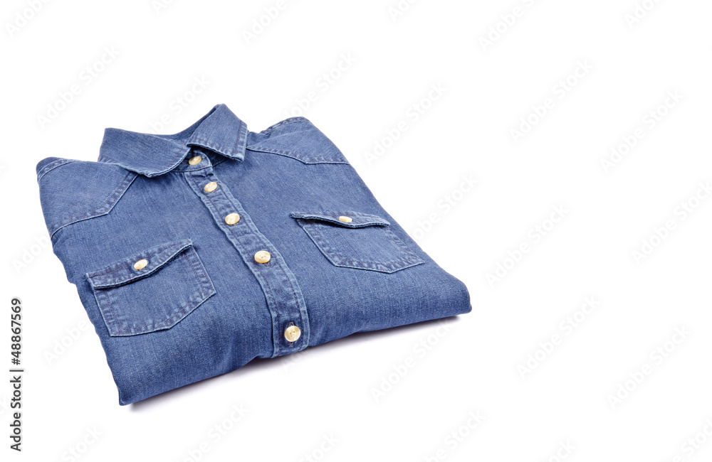 Women's Blue Denim Shirt Folded and Isolated on White Women's Blue Denim Shirt Folded and Isolated on White