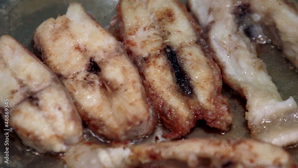 Fish fried in a pan. Part 6. Close-up. Fish fried in a pan. Part 6. Close-up.