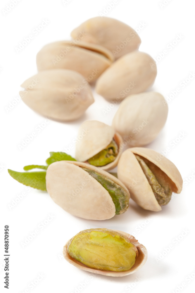 Fototapeta premium Pistachios on white background_I