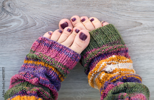 Women feet with purple pedicure