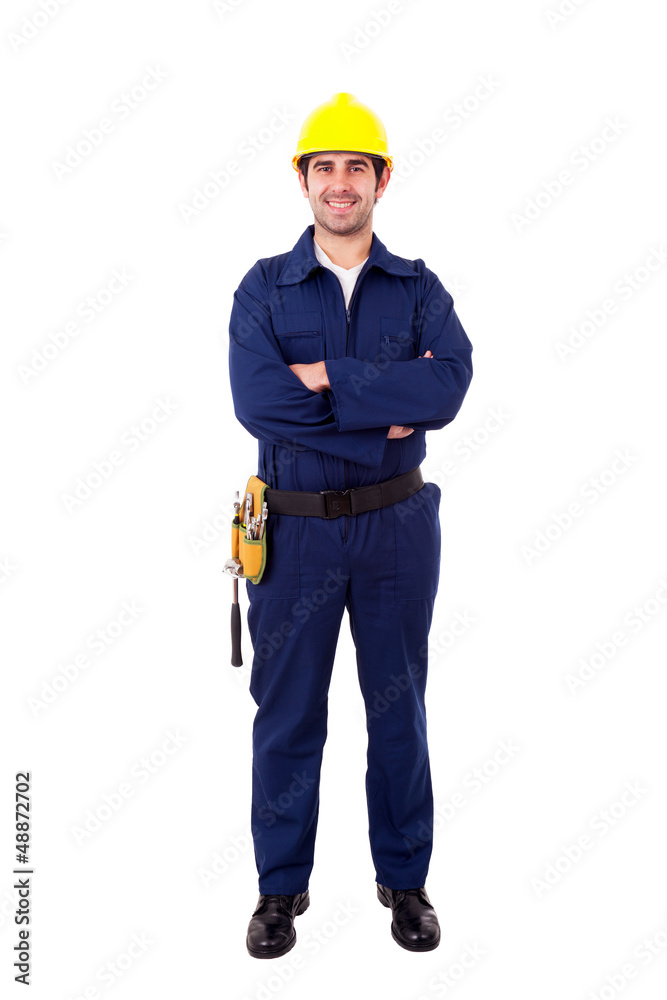 Full lenght portrait of a smiling young builder, isolated on whi