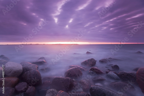 Beautiful baltic ocean scene, sunrise over the coast photo