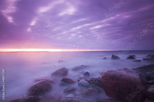 Misty morning over the ocean, sunrise over the Swedish coastline