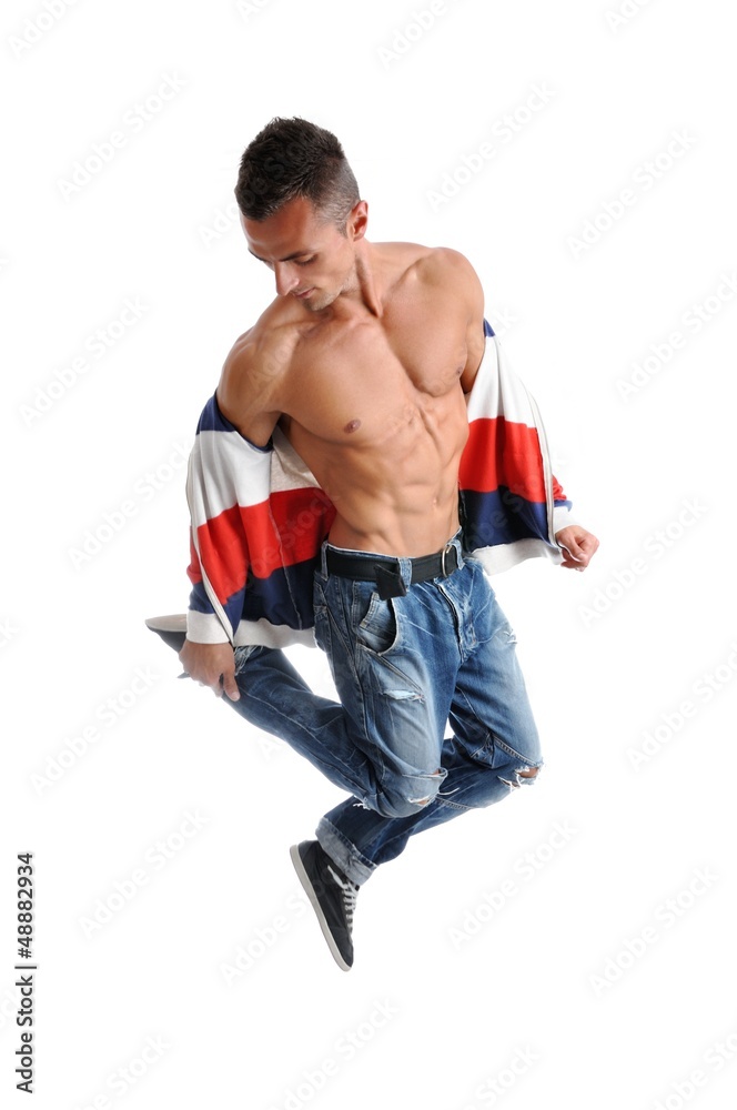 Powerful muscular man posing on a white background Powerful muscular man posing on a white background