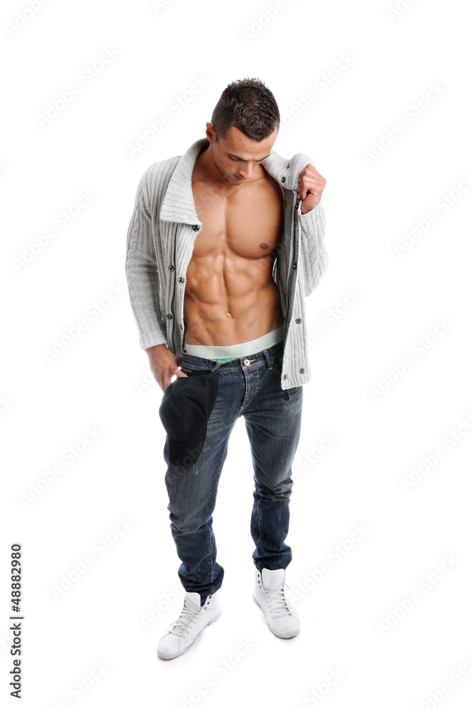 Powerful muscular man posing on a white background Powerful muscular man posing on a white background